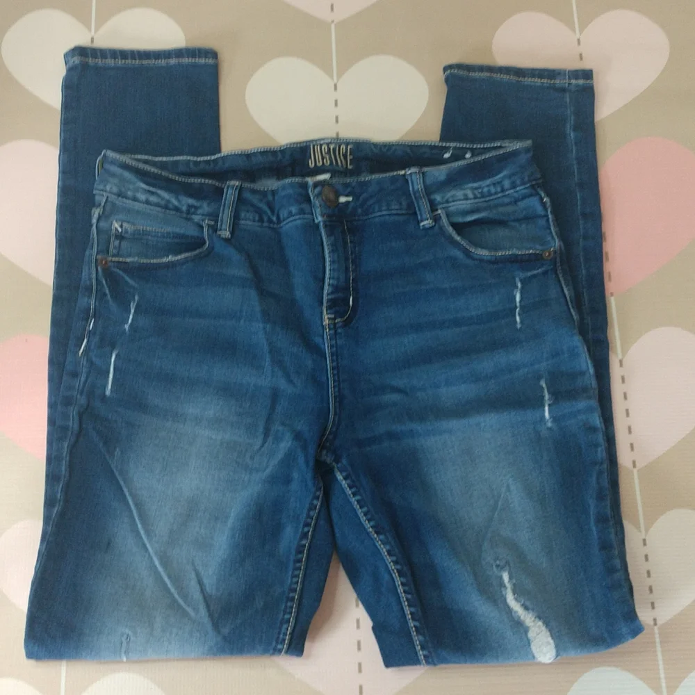 Justice mid rise skinny jeans. Size 16 plus